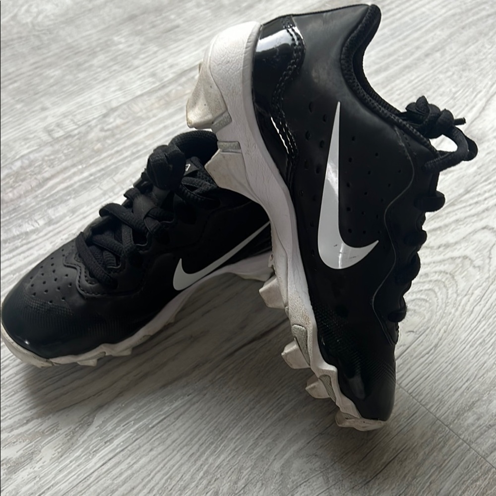 Nike Kids Black &white cleat sport shoes 12C, hardly worn before outgrowing them